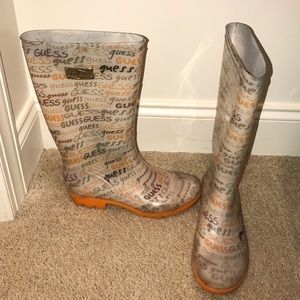 White and orange Guess rain boots